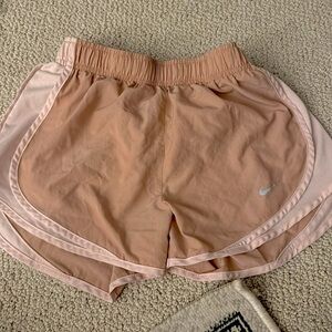 Nike: nude-ish pink athletic shorts